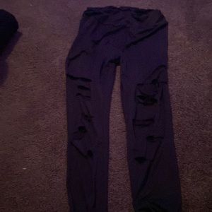 Black ripped leggings. Brand: Romwe Size: M
